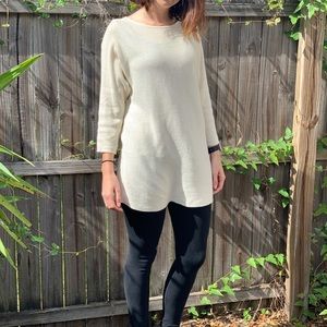Long cream sweater